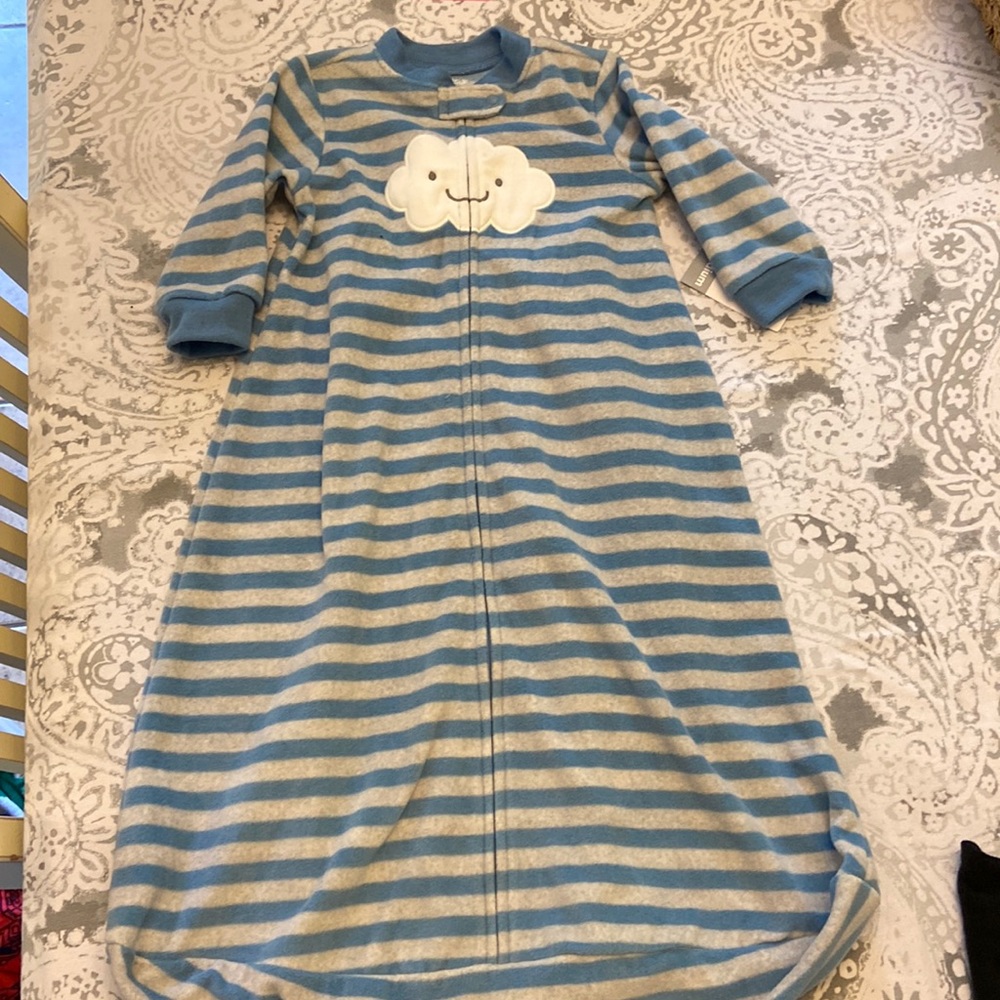 Carter’s size Medium sleep sack.